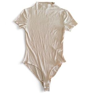 Cream colored ribbed high neck bodysuit